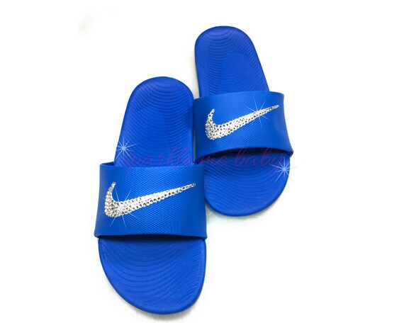 blue and grey nike slides