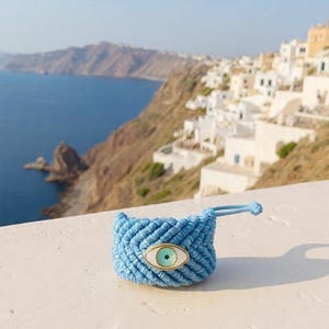Anillo de macramé con ojo malvado hecho a mano, estilo bohemio, ajustable.