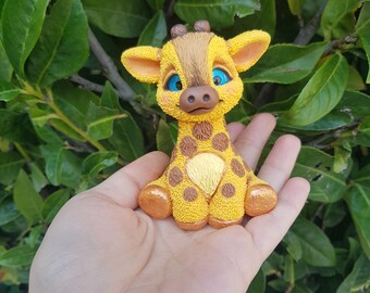 座るキリンの人形 - Etsy 日本