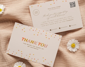 May include: Thank you card with a pink and white background and scattered hearts in yellow and pink. The text reads "Thank You for being the heart of my business".