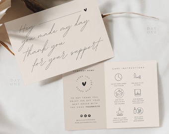 May include: A thank you card with a handwritten message that says "Hey you made my day. Thank you for your support." The card is beige with a black heart in the top right corner. The card is next to a white card with black text that says "Day One" and a black heart in the top right corner. The white card is next to a beige card with black text that says "Company Name" and a black heart in the top right corner. The beige card has a black circle with a black heart in the center and the text "Thank You For Your Order" around the circle. The beige card also has black text that says "To say thank you, enjoy 10% off your next order with the code THANKST0." The beige card also has black text that says "@yoursocialhandle www.yourwebsite.com". The beige card is next to a white card with black text that says "Care Instructions" and black icons and text for candle care instructions.
