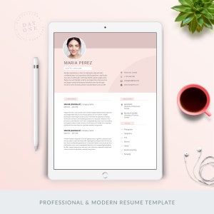 May include: A pink and white resume template on a tablet screen. The resume is for Maria Perez, a graphic designer. The resume includes her contact information, work experience, education, and skills.