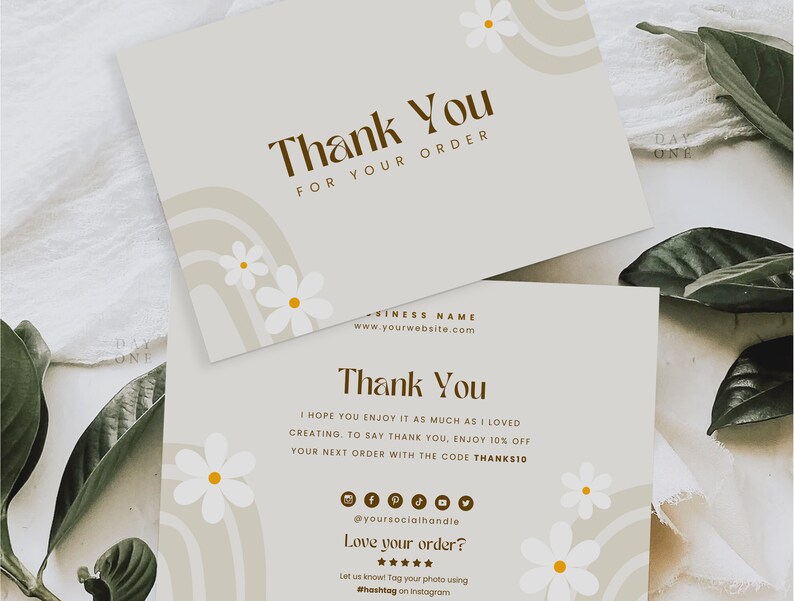 May include: A thank you card with a brown and white floral design. The card has the text "Thank You" and "For Your Order" in brown text. The card also has the text "Business Name" and "www.yourwebsite.com" in smaller brown text. The card has a white background with a brown and white floral design.