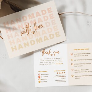 May include: A pink and peach card with the text "Handmade with love" repeated multiple times. The card also includes care instructions for candles, such as "Do not burn longer than 4 hours" and "Trim wick to 1/4 inch (1 cm)".