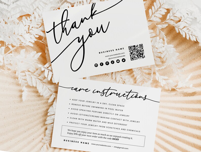 May include: Thank you card with care instructions for jewelry. The card is white with black text and a QR code. The text includes instructions for keeping jewelry clean and avoiding contact with water and chemicals. The card also includes a discount code for 10% off the next order.