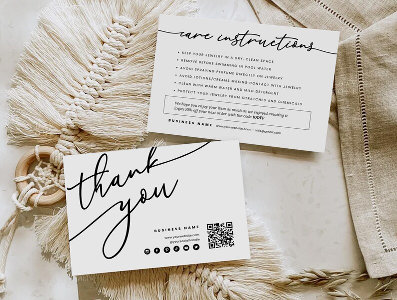 May include: Two white cards with black text. The first card has the title "Care Instructions" and lists instructions for caring for jewelry. The second card says "Thank You" and includes a QR code and social media icons.