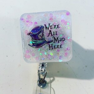 We’re all mad here Alice Wonderland badge reel