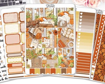 May include: A set of autumn-themed planner stickers with a variety of designs, including a cosy living room, a book stack, a cup of coffee, and a pumpkin. The stickers are in shades of brown, orange, and yellow.