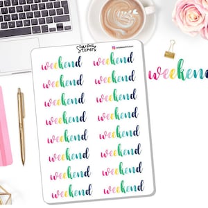 May include: A sheet of colorful "weekend" stickers with a rainbow gradient effect. The stickers are arranged in two columns of five stickers each.