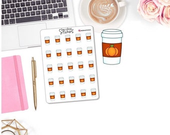 May include: A sheet of stickers featuring a pumpkin spice latte design. The stickers are white and brown with an orange pumpkin graphic. A single sticker with the same design is also shown. The sheet has the text "Daily Dose of Stickers".
