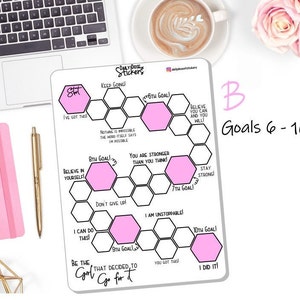 May include: A white dry-erase board with a pink honeycomb design. The board has motivational phrases and goals written on it. The board is labeled "Daily Dose Stickers" and "Goals 6-10".