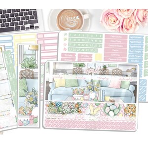 May include: A set of decorative planner stickers featuring pastel-colored illustrations of a living room scene, Easter eggs, and floral arrangements. The sheets include a monthly calendar for April, various labels, and functional strips in soft pink, green, and blue tones.