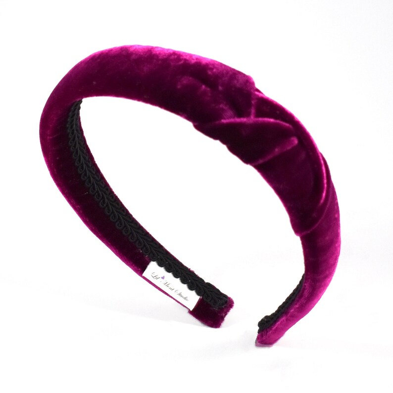 Narrow silk velvet headband with intricate design on the