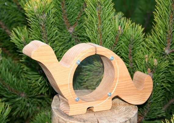 wooden dinosaur piggy bank