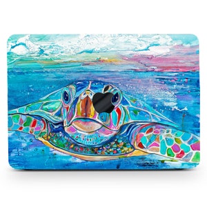 May include: A laptop skin featuring a vibrant, colorful sea turtle swimming underwater. The design includes shades of blue, green, pink, and yellow, with a watercolor effect. The turtle's face is central, with the Apple logo visible.