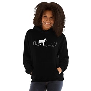 May include: Black hooded sweatshirt with a white graphic of a horse, horseshoe, and a heart with a heartbeat line.