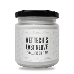 May include: White candle jar with a black lid and a label that says "VET TECH'S LAST NERVE LOOK...IT IS ON FIRE!" with a bone pattern background. The label also says "I LOVE VETERINARY".