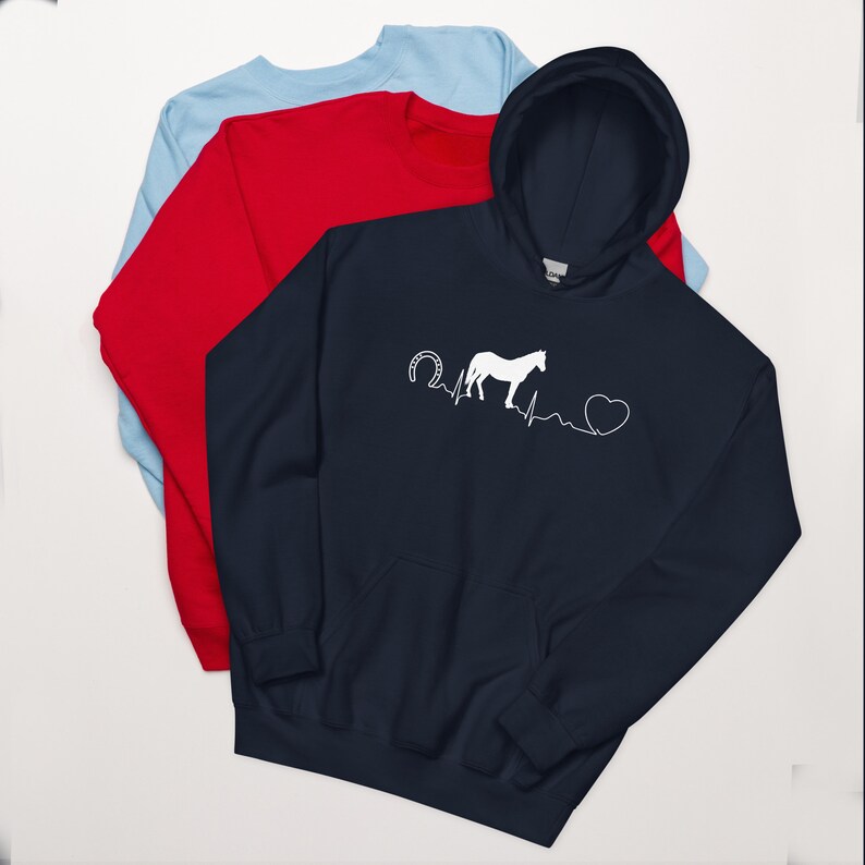 May include: A navy blue hoodie featuring a white horse, horseshoe, and heartbeat graphic. The hoodie is also available in other colours.