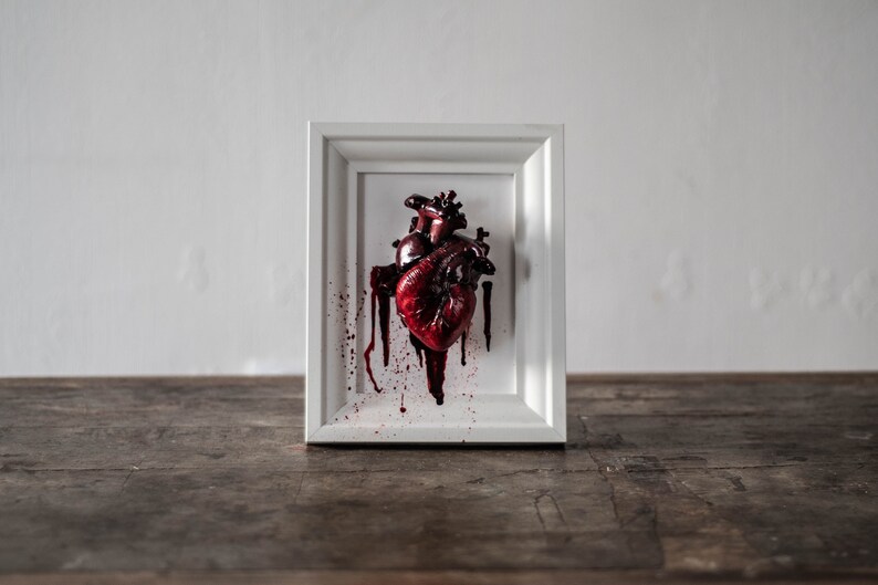 Anatomical human heart in a frame image 2