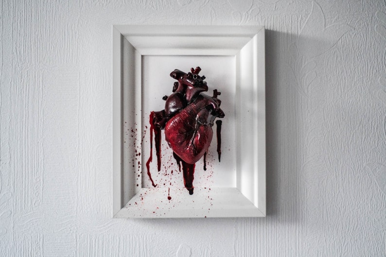 Anatomical human heart in a frame image 4