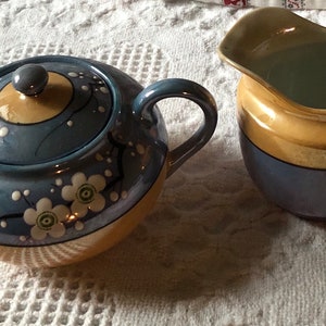 Vintage lusterware floral sugar bowl  and creamer set