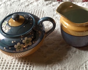 Vintage lusterware floral sugar bowl  and creamer set