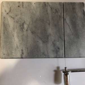 Cheese cutter gray white marble footed base wired lever handle 6x9