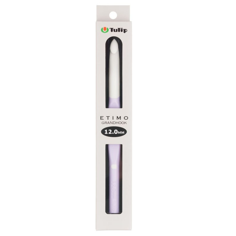 May include: A Tulip Etimo Grandhook crochet hook in a white retail box. The hook features a white tip and a light purple handle. The packaging displays the text Tulip, Etimo Grandhook, and 12.0mm in a black oval. The hook is visible through a cutout.