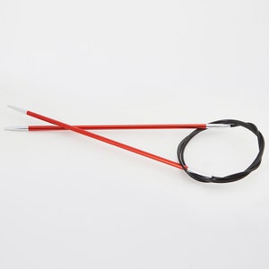 May include: Red circular knitting needles with silver tips and a black cable. The needles are crossed, and the cable forms a loop. The needles are made of metal and are designed for knitting projects.