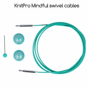 May include: KnitPro Mindful swivel cables in teal with silver tips and decorative end caps. The cables are coiled and the end caps have a floral design.