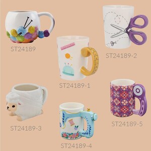 May include: A selection of ceramic mugs with distinctive designs. One mug has yarn and knitting needles, another features scissors, and a third is shaped like a sheep. Other mugs have sewing-themed handles and patterns.