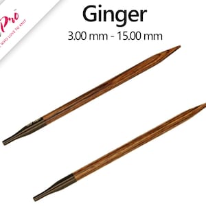 May include: Two KnitPro Ginger knitting needles with a dark brown wood grain pattern and smooth, tapered tips. The needles feature dark metallic connectors at the base, with the text Ginger and 3.00 mm - 15.00 mm visible at the top of the image.