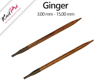 May include: Two KnitPro Ginger knitting needles with a dark brown wood grain pattern and smooth, tapered tips. The needles feature dark metallic connectors at the base, with the text Ginger and 3.00 mm - 15.00 mm visible at the top of the image.