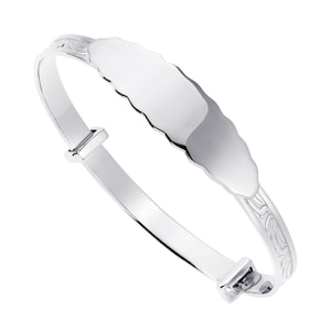 May include: A polished silver-tone bangle bracelet featuring a smooth, scalloped-edge central identification plate and engraved scrollwork patterns along the sides of the band, designed with an adjustable sliding mechanism for a secure fit.