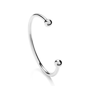 May include: A silver bangle bracelet with two round balls at the ends.