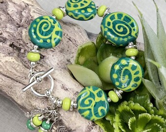 GREEN AMMONITE, handmade, artisan lampwork and sterling silver bracelet