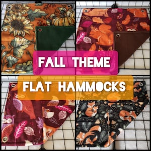 May include: Four different flat fleece hammocks with fall-themed prints. The hammocks are made of soft fleece and have a brown, green, or black backing. The prints feature owls, squirrels, pumpkins, and leaves in shades of orange, red, and brown. The text "FALL THEME FLAT HAMMOCKS" is displayed in the center of the image.