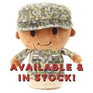 May include: A plush toy soldier wearing a camouflage uniform with a name tag that reads "SMITH US BRANCH".