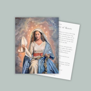 May include: A painting of the Virgin Mary, depicted with a blue robe and a red sash, holding a white cloth in her left hand and a knotted rope in her right hand. The painting is set against a background of clouds and stars. The text "er to er of Knots" is visible in the lower right corner of the image.