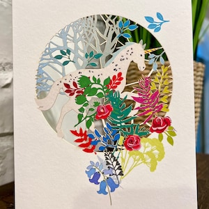 Unicorn in garden laser cut greeting card
