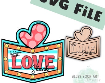 May include: SVG file for a Valentine's Day sign that says "Welcome to the Love Shack" with a heart and lights. The sign is in a retro style with a blue and orange color scheme.