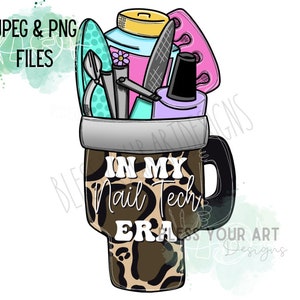 May include: A leopard print coffee mug with a black handle. The mug is filled with nail tools, including a nail file, cuticle pusher, nail clippers, and nail polish bottles. The text "In My Nail Tech Era" is printed on the mug.