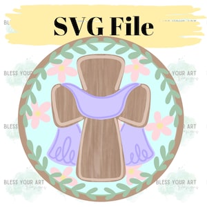 May include: A digital SVG file featuring a wooden cross with a light purple cloth draped over it. The cross is surrounded by a light blue background with pink flowers and green leaves. The text "SVG File" is at the top.