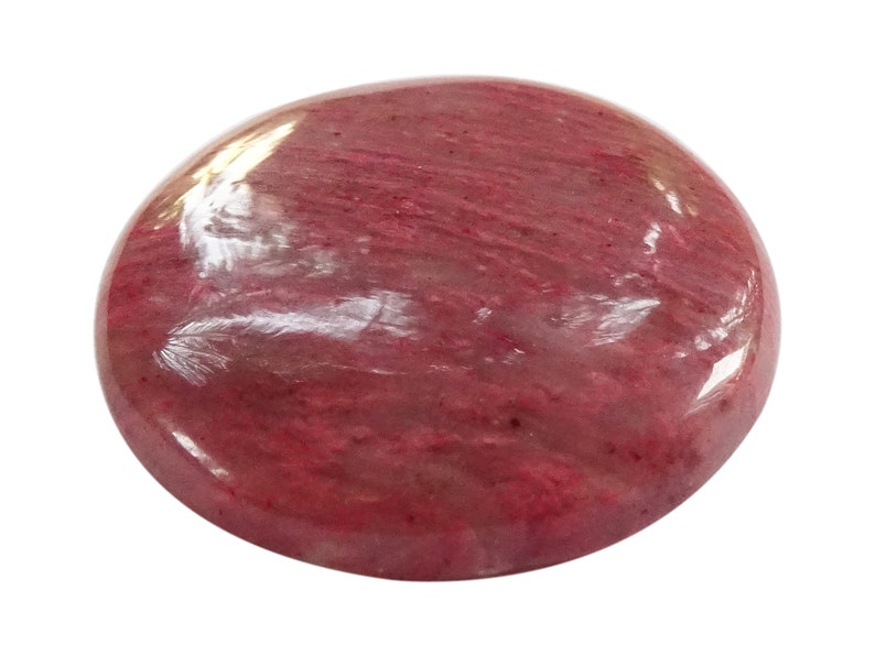 May include: A smooth, round, polished pink gemstone with a swirling pattern.