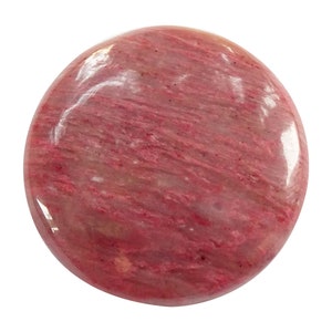 May include: A smooth, round, pink and white polished stone with a swirling pattern.