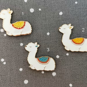 Lama cabochon needle minder for cross stitching/embroidery