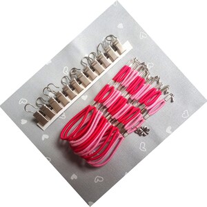 Set med 12 sidospännare för broderiramar/Scroll Rod Sidospännklämmor