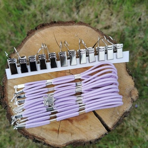 Set med 12 sidospännare för broderiramar/Scroll Rod Sidospännklämmor