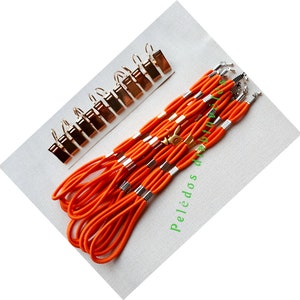 Set med 12 sidospännare för broderiramar/Scroll Rod Sidospännklämmor