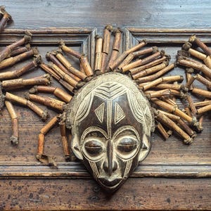 Three vintage Chokwe tribe masks, available individually or as trio
